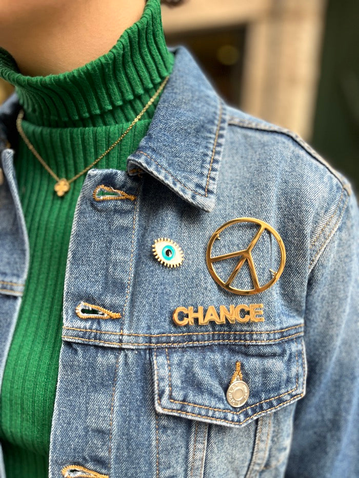 Broche peace and love en acier doré