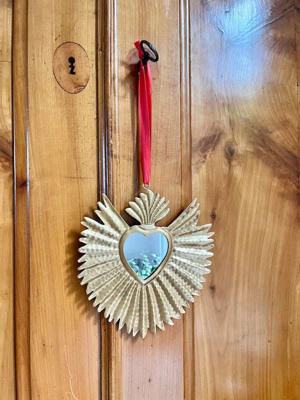 Ex-Voto miroir rayonnant en métal doré