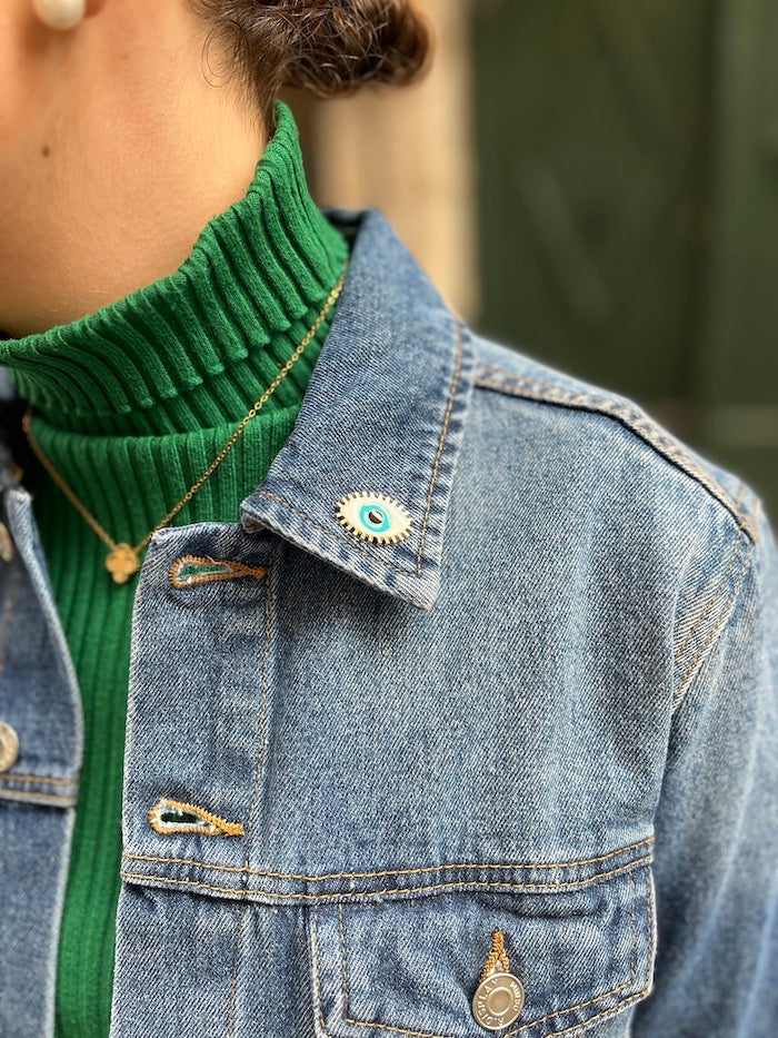 Pin's oeil protecteur