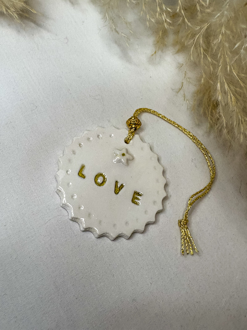 Porte bonheur fait main Médaille Love