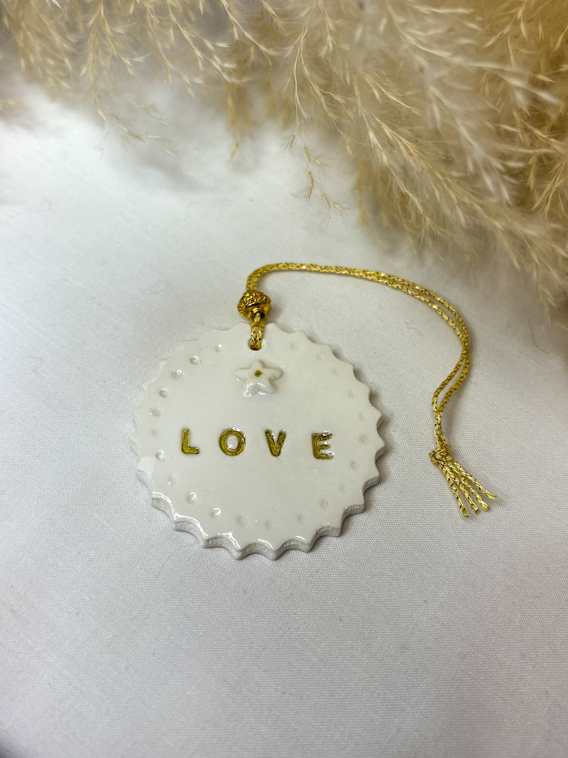 Porte bonheur fait main Médaille Love