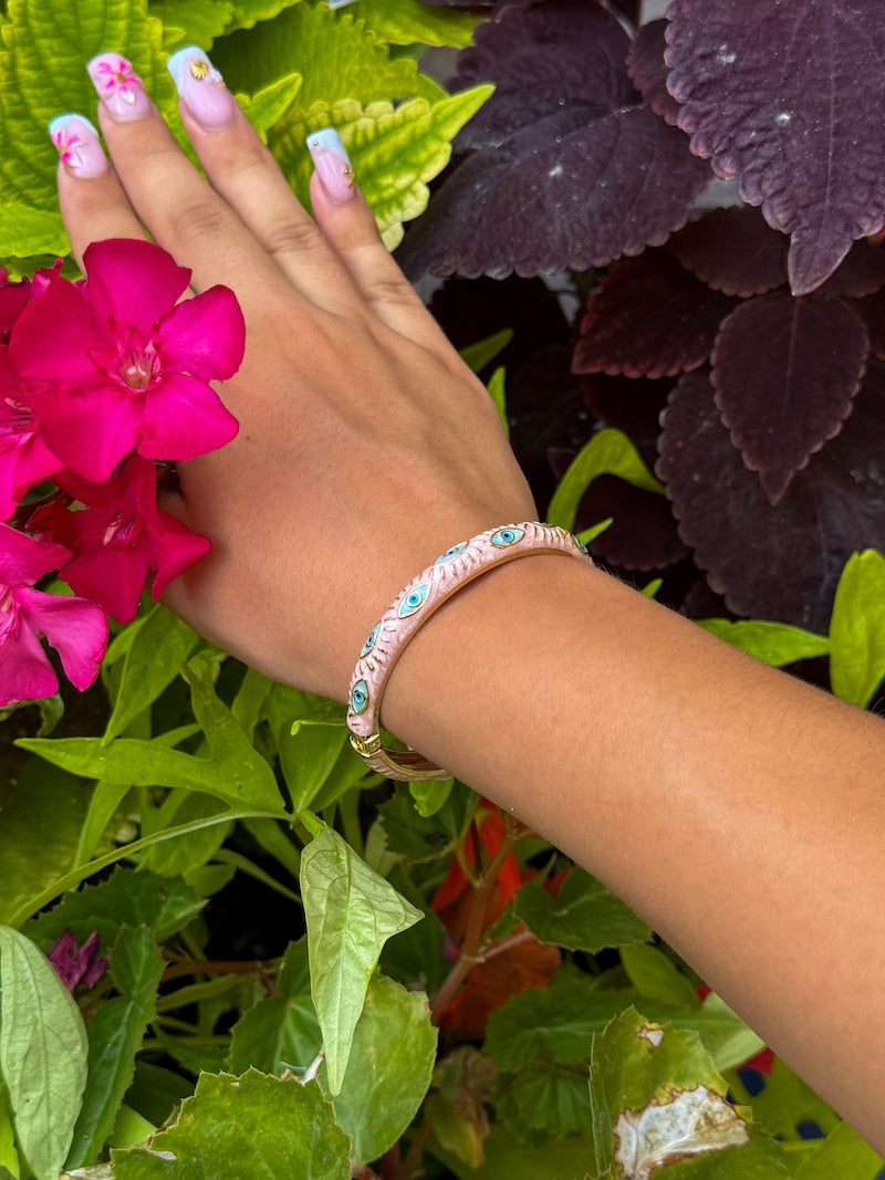 Bracelet jonc rose pâle en acier oeil protecteur