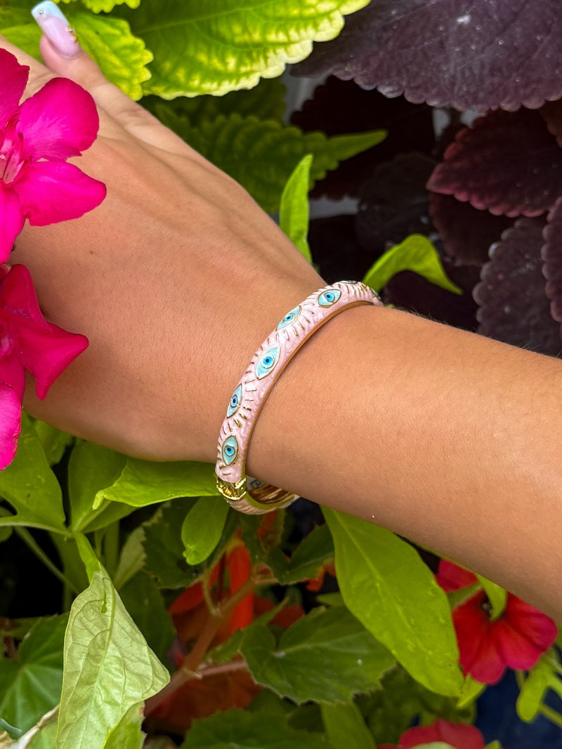 Bracelet jonc rose pâle en acier oeil protecteur