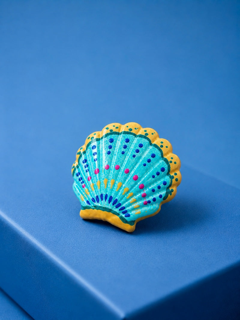 broche coquillage bleu et doré tendance