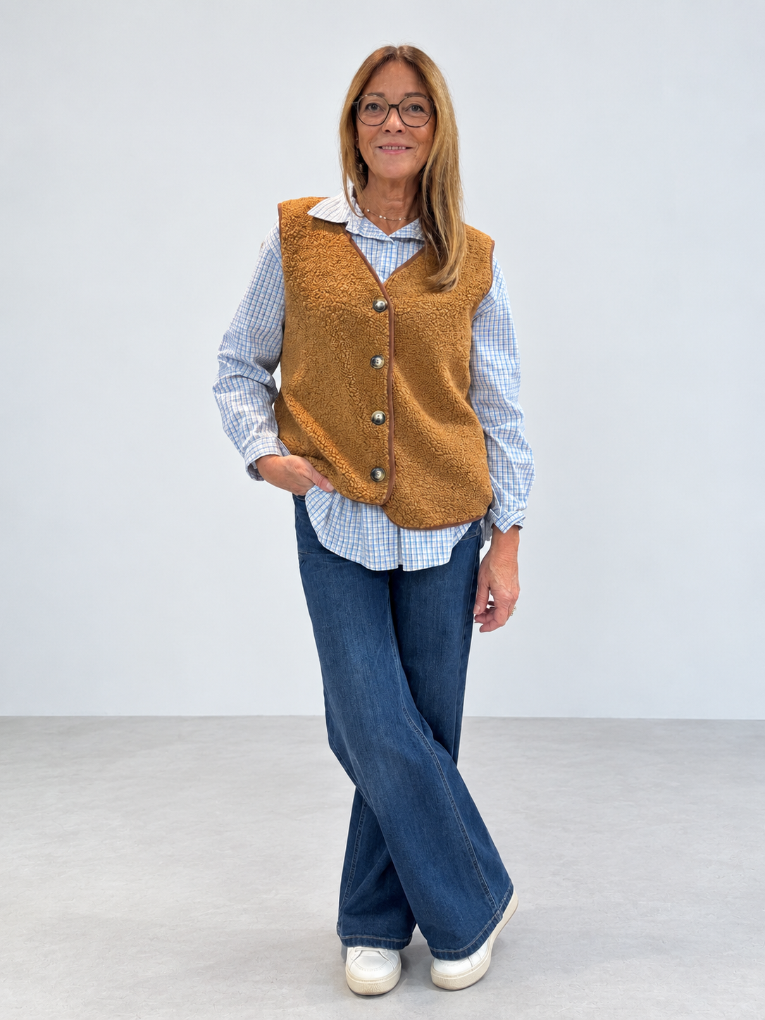 Gilet sans manches en moumoute à boutons