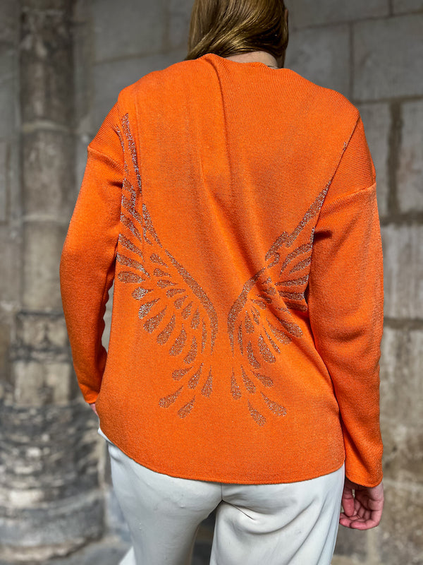 Pull orange en maille motif étoile et aile d'ange
