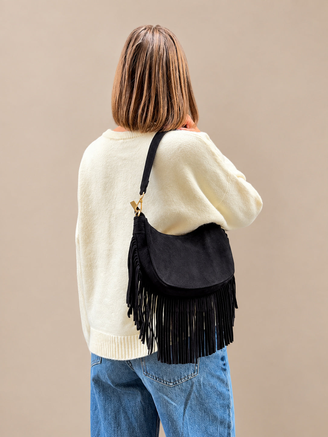 sac à main tendance à franges en daim noir