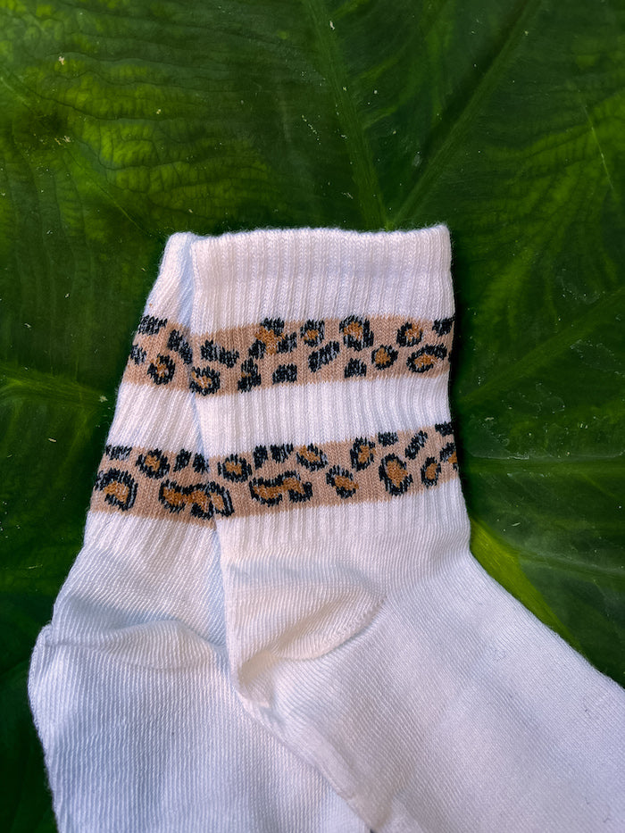 Chaussettes blanches à bandes léopard