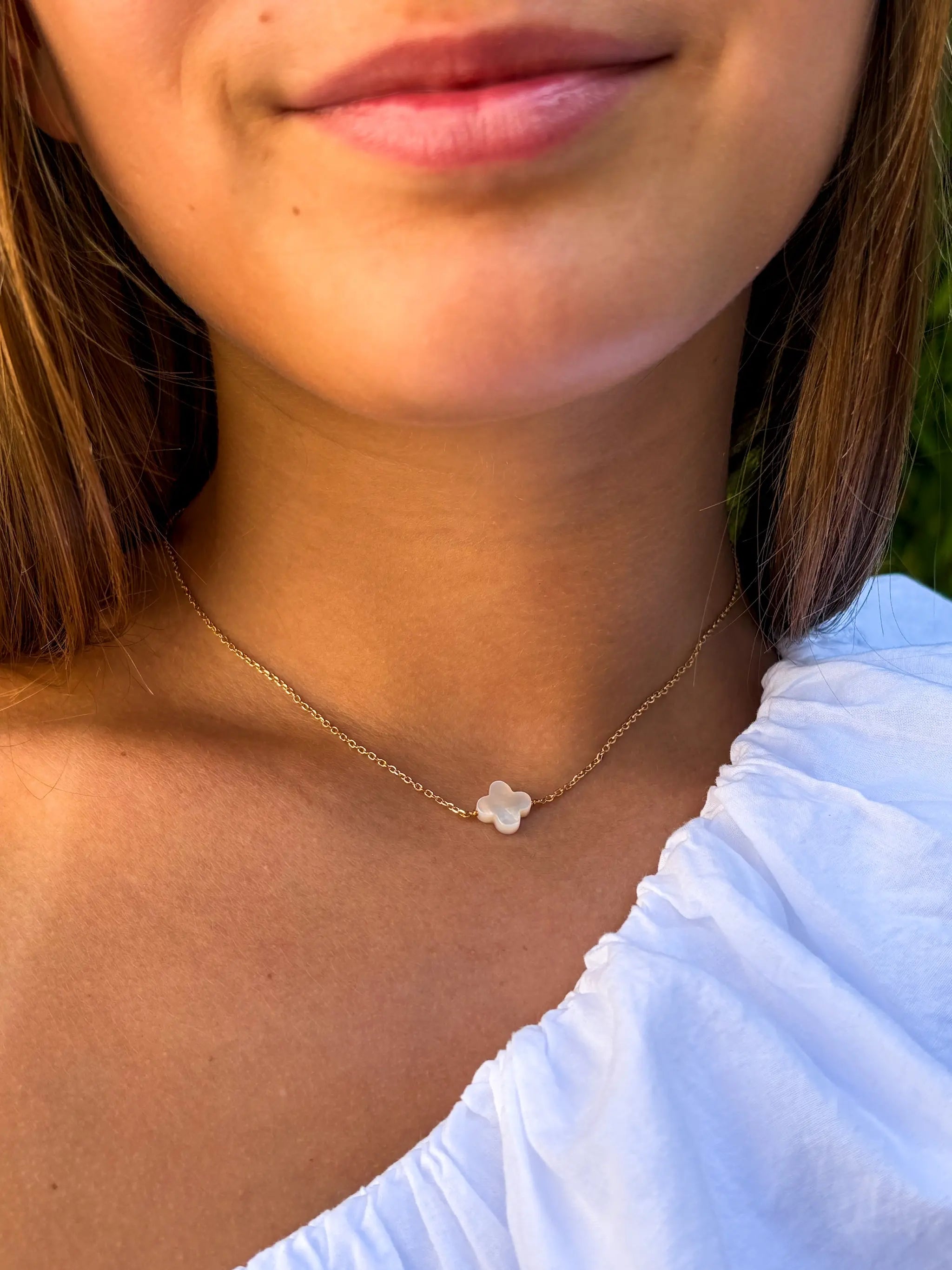 Collier trèfle porte-bonheur doré