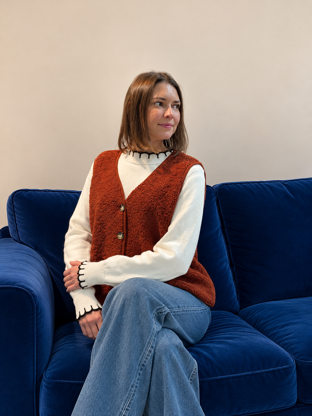 Gilet sans manches en moumoute à boutons