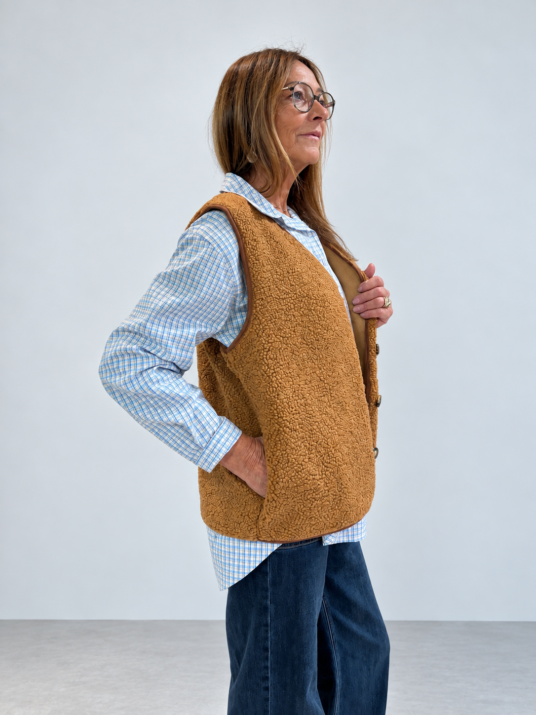 Gilet sans manches en moumoute à boutons