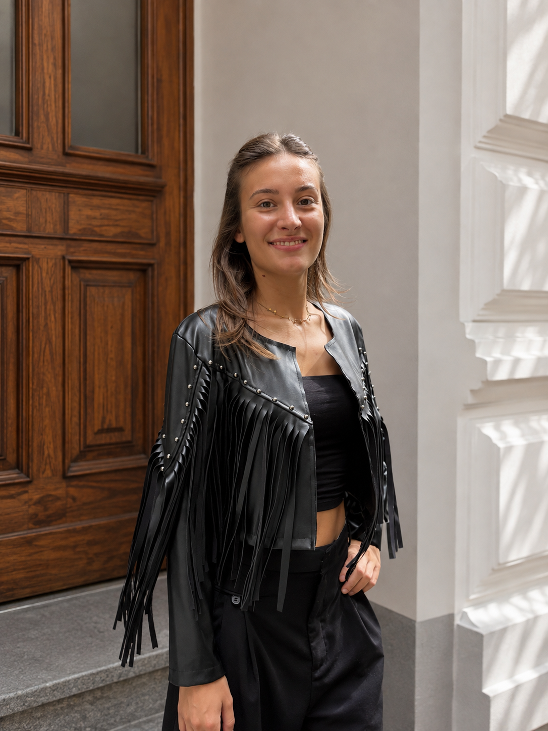 veste courte en similicuir à franges style rock et cowboy